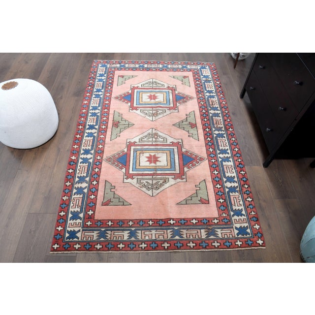 Vintage Hand-Knotted area rug is a semi-antique vintage area rug. The '70s Eastern region of Anatolian's unique rug is...