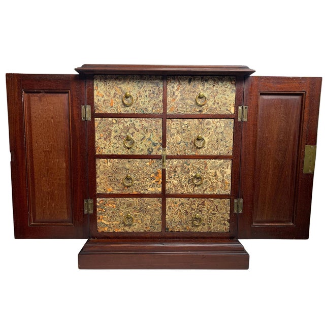 19th Century Victorian Antique Mahogany Brass and Burl Walnut Six Drawer Table Top Collectors Cabinet. This is a small...