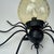 Italian Brutalist Iron and Murano Amber Glass Spider Wall Lamp, 1960s, in Very Good conditions. Designed 1960 to 1969 Up...