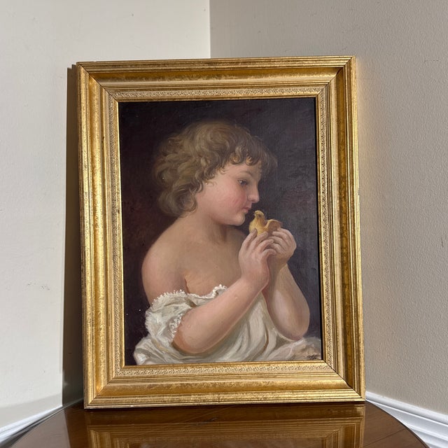 Antique Style Oil Painting – Child with Chick – Framed Beautiful classical-style oil painting depicting a young child...
