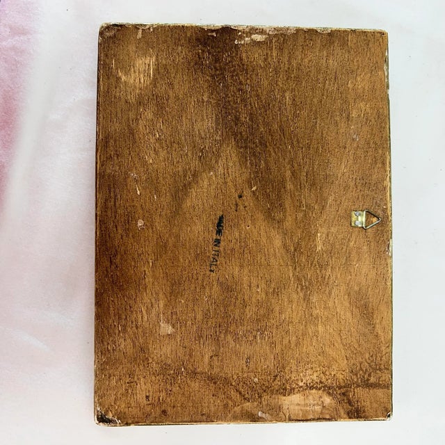 Mid century Italian Florentine panel depicting dancing couple. Measures 8" w x 6" h with gold and white surround.