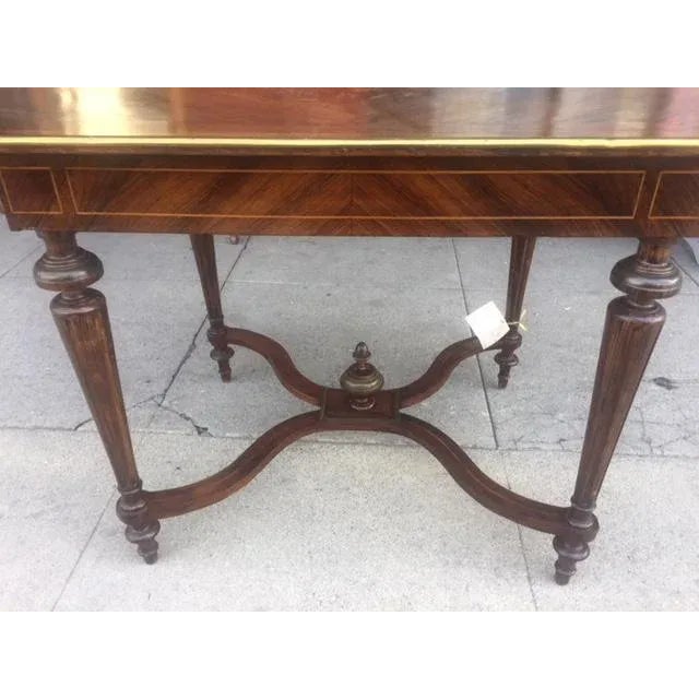 French Inlaid Table With Stretcher. Made in the late 1890s-1900s.
