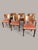 A high-quality set of six German dining chairs from around 1940/50, crafted in walnut or walnut veneer. The chairs are...