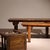 ​The three-piece ensemble consists of two solid wood benches and a matching stool featuring a puristic Wabi-Sabi...