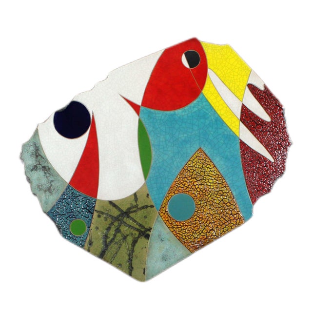 Three irregularly shaped slabs carrying a vivid and joyful palette. The upper slab moves through white, teal, red, and...