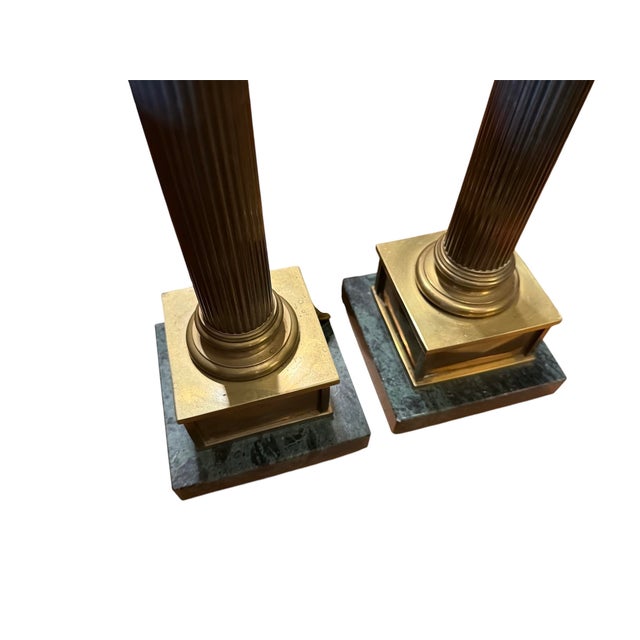 This listing is for a fabulous pair of Chapman vintage neoclassical fluted brass column table lamps. They've been re-wired...