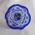 This is a smaller blue cut to clear vase. The entire vase is cut down to the base and the cuts are clean and symmetrical...