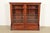 A gorgeous antique Eastlake Victorian bookcase cabinet In the manner of Herter Brothers USA, Circa 1880s Carved mahogany,...