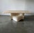Vintage Italian travertine dining table with an impressive wave-shaped sculptural base. A true centerpiece for any dining...