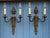 This exquisite antique pair of French twin arm wall lights, crafted from luxurious bronze and brass, brings a touch of...