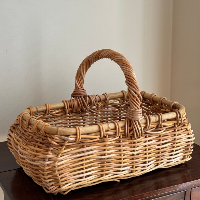 Offering a lovely French-style rectangular storage basket from the late-20th century. Love the thick willows, warm patina,...