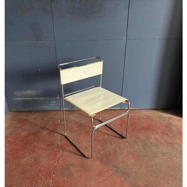 These chairs were designed by Giovanni Carini and made by Planula in Italy in the 1970s. Each chair has a tubular chromed...