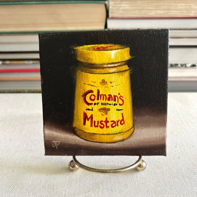 Original miniature still life painting by Jane Palmer featuring a bright yellow Colman’s mustard tin against a dark, moody...