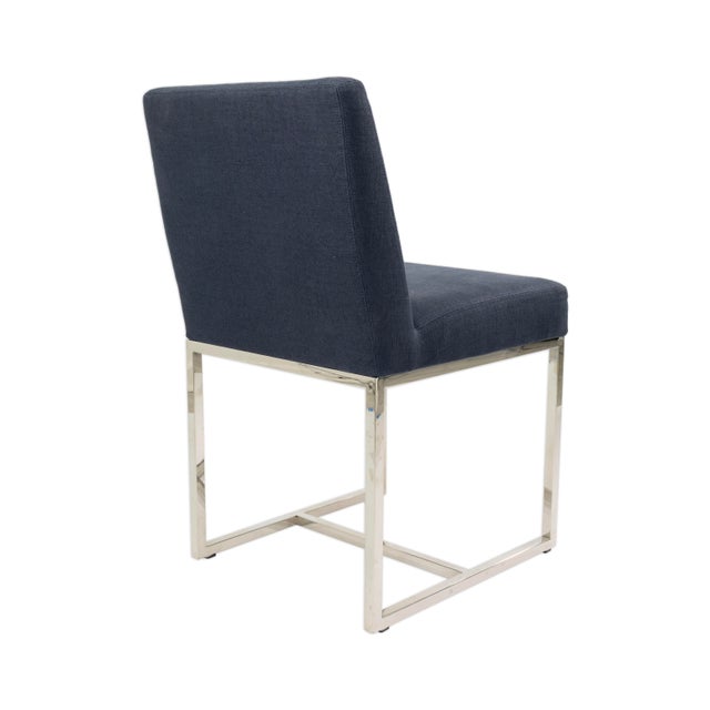 Elevate your dining space with this Set of 8 Blue Upholstered Dining Chairs by Restoration Hardware. Designed with clean...