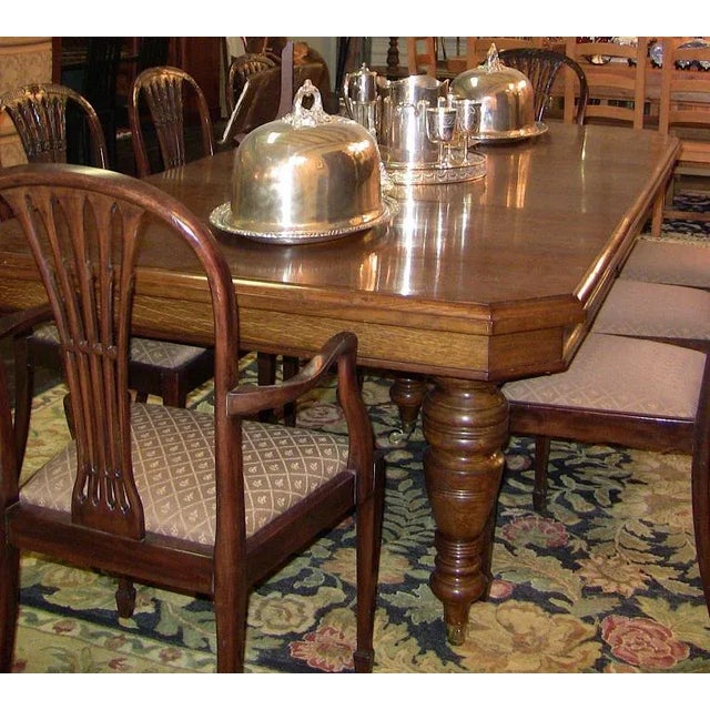 From circa 1860………..5 beautifully turned baluster legs on brass castors……beautiful oak patina on top………high gloss finish....