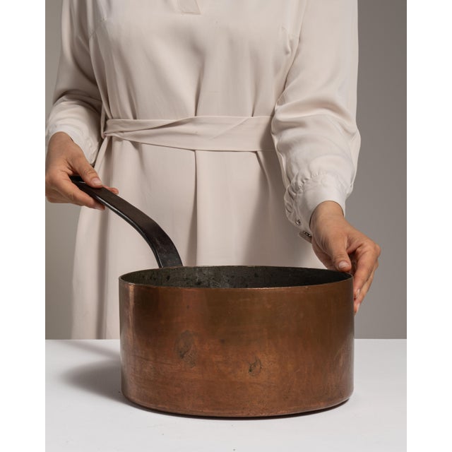 This 19th century serving piece from Belgium is finished in terra cotta, worked in copper. Its form follows honest, well-...