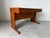 Beautifully crafted in Denmark by Vi-Ma Møbler, this 1970s Mid-Century Modern teak desk showcases the clean Scandinavian...
