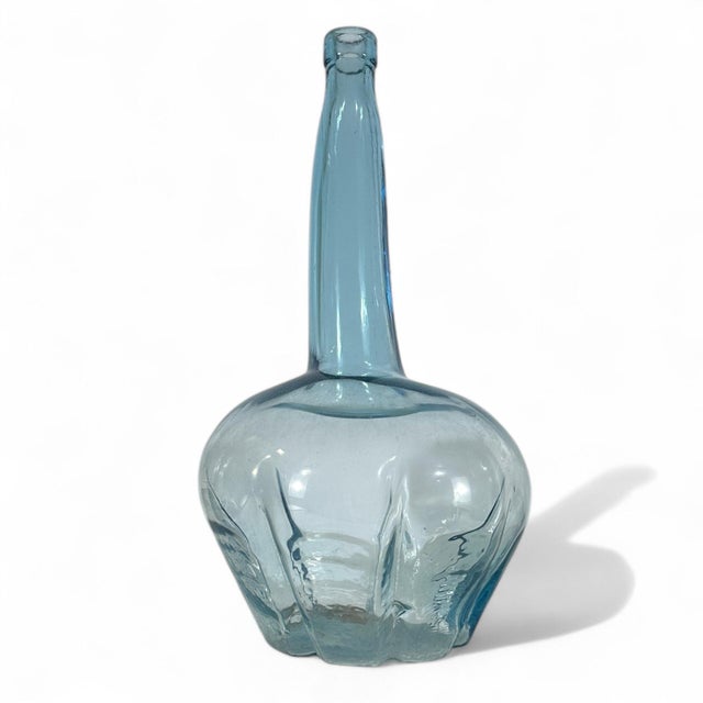An antique 12" blue demijohn / carboy bottle. This appears to be hand blown and is assumed to be antique. We are not...