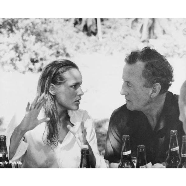 Flemming and Andress James Bond creator Ian Fleming chats with actress Ursula Andress between scenes of the upcoming...