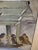 Charming original watercolor circa 1950 depicting birds at a feeder. Signed Catherine Meyers. In a simple Ivory painted...