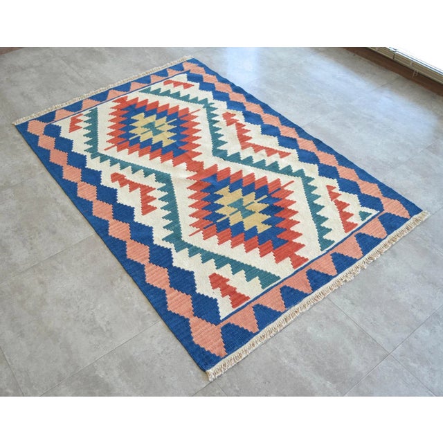 Dimension: 45" x 67" Excluding fringe Material: Wool on wool Origin: Oushak Weight: ~5.3 lbs All images are of the actual...