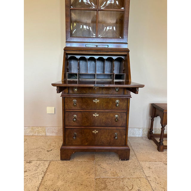 Drexel Heritage “Et Cetera Collection” Narrow Inlaid Walnut slant Front Secretary Bookcase with Bubble Glass Door. This is...