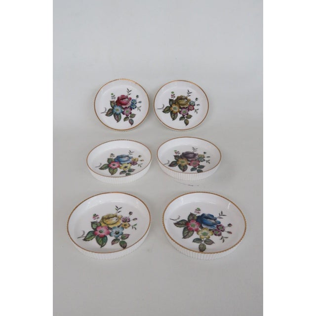 This lovely Set of 6 Coasters is made of fine bone china. All pieces are stamped individually as follows, "Coaster | Royal...