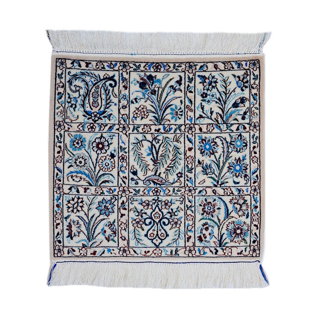 A few nain rugs made of cod and silk on cotton and is in a new and unused state. Very fine and dense link with approx....