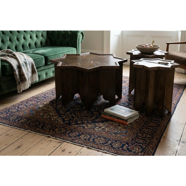 An exceptional set of three graduated nesting tables by Lane Furniture, showcasing an architectural interpretation of...