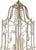 Antique silver leaf finish on iron with clear crystals. Twelve lights. Comes with 9 feet of chain. 46h x 35w x 35d