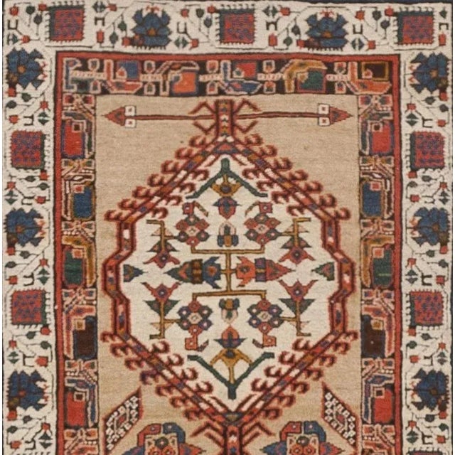 Triple medallion on a camel background.