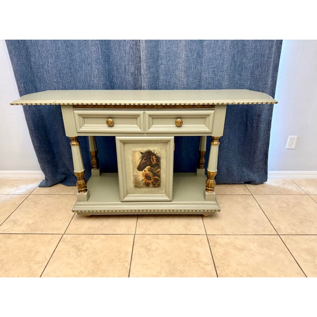This 1973 Thomasville piece has been beautifully transformed with an equestrian flair. It’s painted in muted sage with...