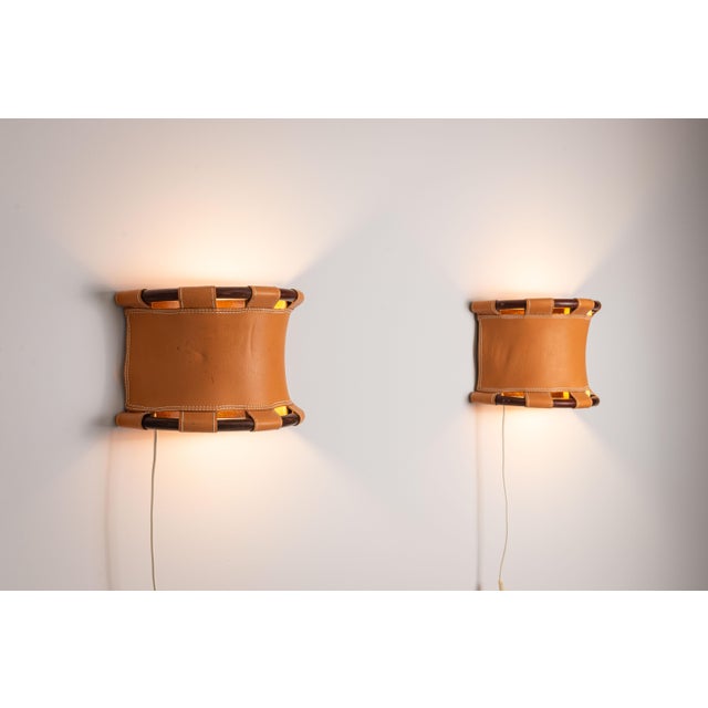 This striking pair of wall lamps, designed by Anna Ehrner for Ateljé Lyktan, embodies the refined simplicity...