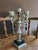 Elevate your space with this striking vintage Dilly MFG. Co. four-arm candelabra. Perfectly balancing industrial edge with...