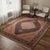 This exquisite Persian-style hand-knotted rug showcases an intricate medallion design with a beautiful floral border. The...