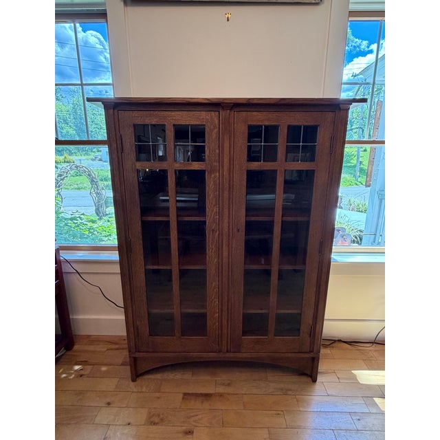 Up for sale in Sunapee Harbor is an estate Stickley double door bookcase from the Mission Oak Collection. This was bought...