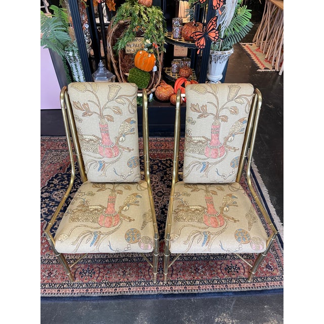 A striking pair of 1970s vintage brass faux bamboo chairs, freshly reupholstered and ready to shine in your space. These...