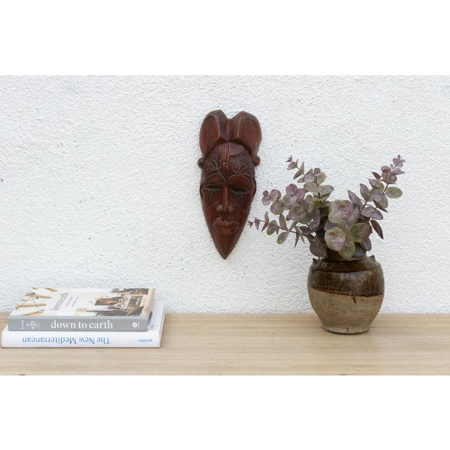 This charming Kwele mask from Gabon or the Republic of Congo is a delightful example of African tribal art. The mask is...