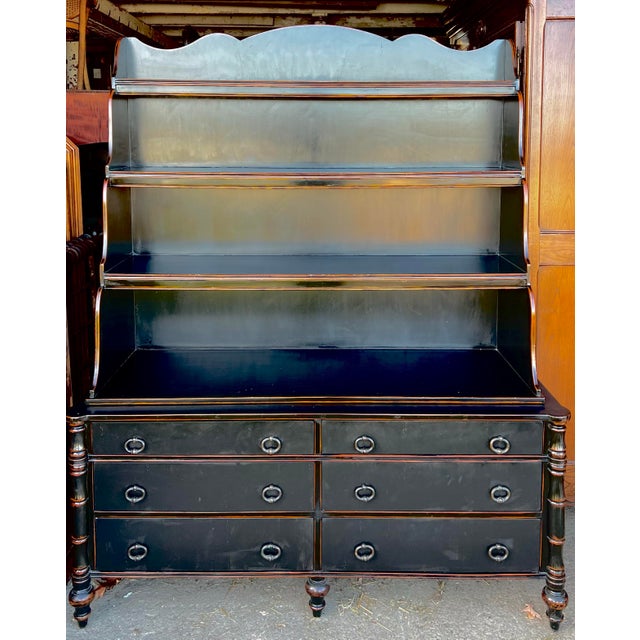 Ebonized Regency style waterfall hutch, by Theodore Alexander from the Ateliers de la Madeleine collection. Bookcase type...