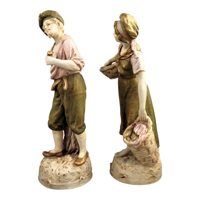 This refined pair of royal dux porcelain figures represents a fisherman and a fisherwoman, produced in bohemia around...