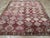 A vintage Turkish Anatolian tribal room size carpet handmade during the mid-20th century. Measures: 10' 11" x 12' 10"