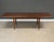 A mid century modern teak dining table with two 20.75” butterfly leaves that fully extend the table to 109.5” wide. Made...