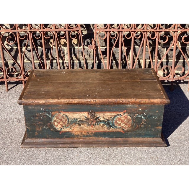 This is an interesting and unusual trunk. The construction is typically German. The bold moldings pegged into the lid...