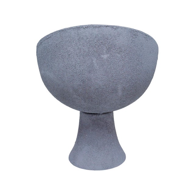 Earthy, sculptural, and effortlessly refined, this pedestal bowl brings a grounded, organic presence to any space. Crafted...