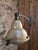 This vintage wall-mounted light, dating from the 1950s, is designed in the style of a traditional street lamp. Originally...