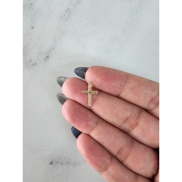 ♥ Product Summary ♥ Details: Cross with Heart Center Design Material: 14k Yellow Gold Dimensions: 15MM x 10MM Weight: 1 gram