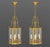 Pair of Regency Style Gilt Brass Hanging Lanterns, each with four candlestick form light fittings. 39" H x 12.25"...