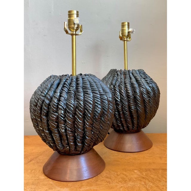 This pair of vintage custom slab-built ceramic lamps designed by Kass O'Brien blends sculptural pottery with refined...
