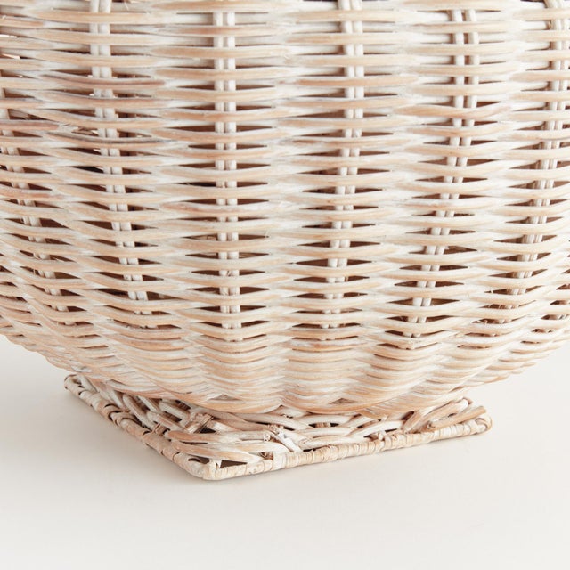 Doublewalled and scaled to impress, this 18inch rattan woven footed bowl is a stunner. With beautiful varying natural...