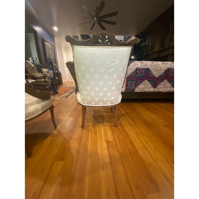 Two (2) identical chairs upholstered in a creme with bumble bee embroidered into the fabric. Stunning chairs that have...